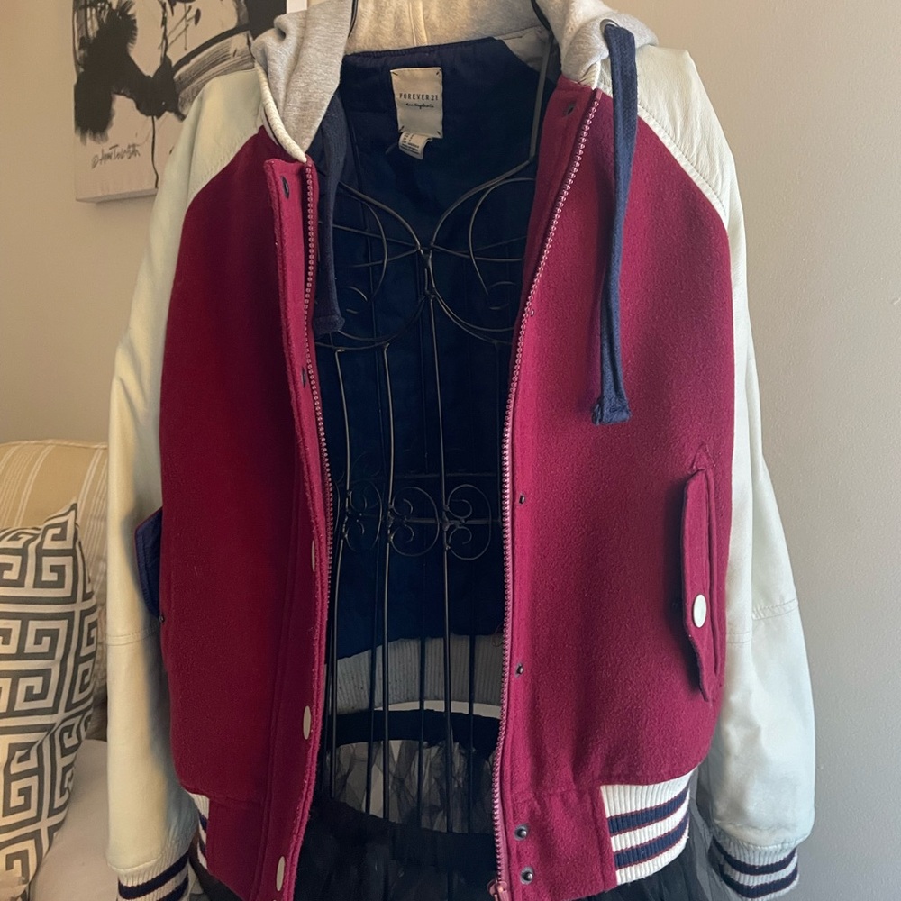 Varsity hooded jacket with leather sleeves